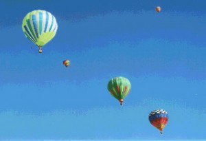 A line of balloons at dawn