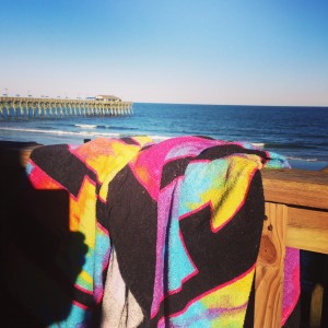 Beach Life - colorful towels drying on the porch