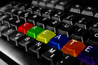 A keyboard with the letters C-R-E-A-T-E added in colorful letters