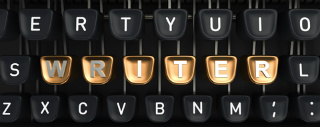 A typewriter with the word "writer" in the keys
