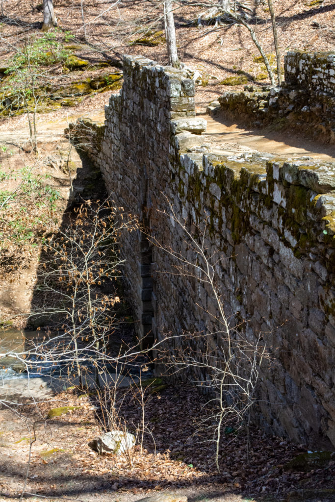 Vertical view of an old stone bridge
