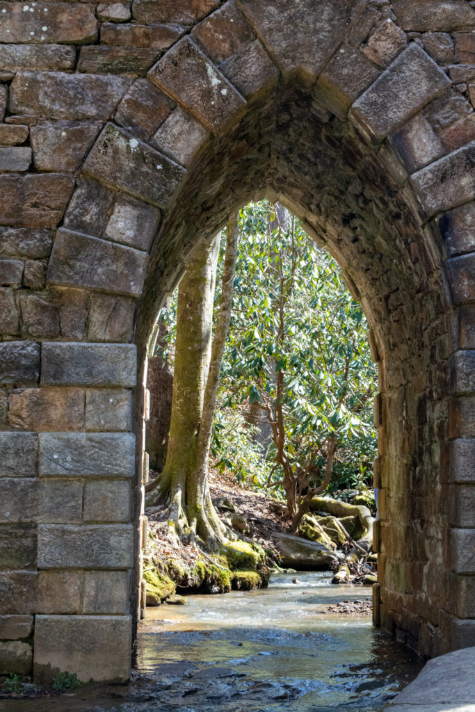 View from beneath an old stone bridge