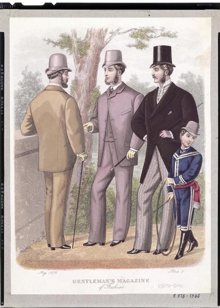 3 Victorian men and a boy on a street